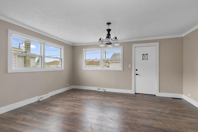 unfurnished dining area with a chandelier, dark wood finished floors, visible vents, and baseboards