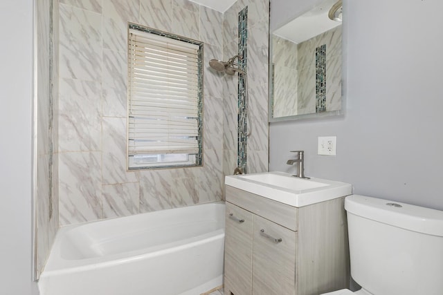 full bath featuring shower / bath combination, vanity, and toilet