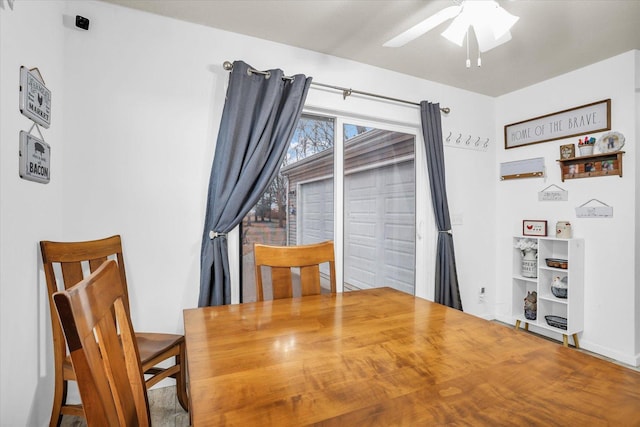 dining area with ceiling fan