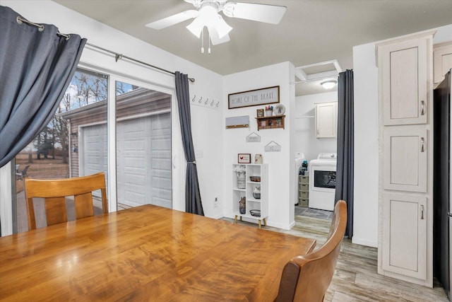 dining room featuring washer / dryer, attic access, baseboards, a ceiling fan, and light wood-type flooring