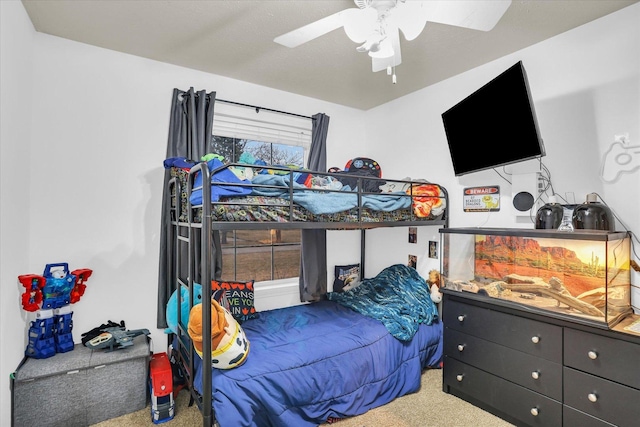 bedroom featuring carpet floors and a ceiling fan