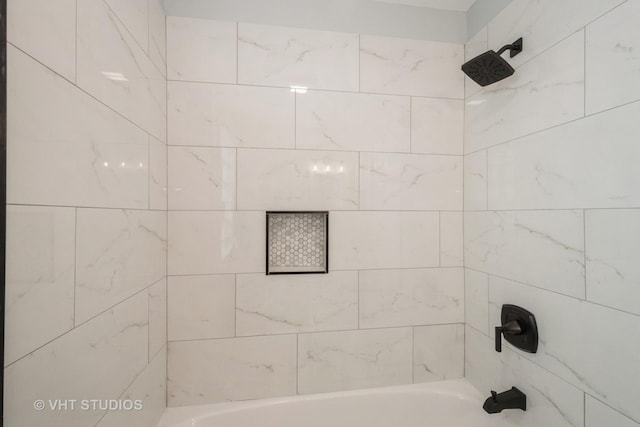 full bath featuring shower / bathtub combination