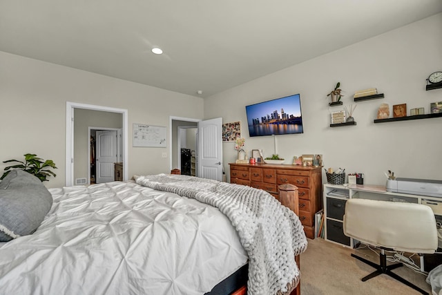 bedroom with light carpet