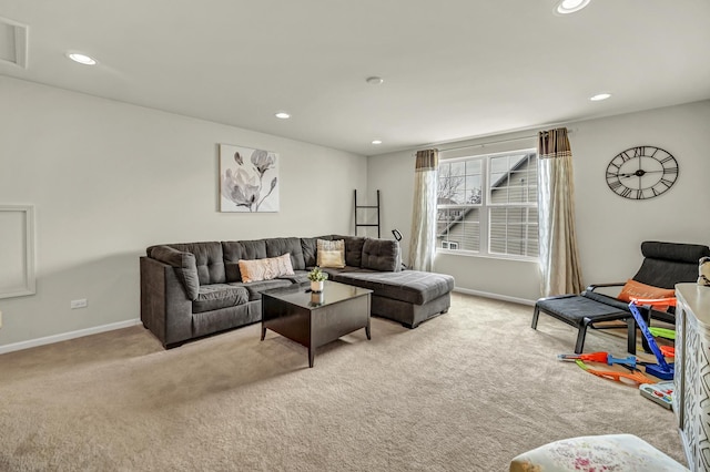 living room featuring baseboards, carpet, and recessed lighting