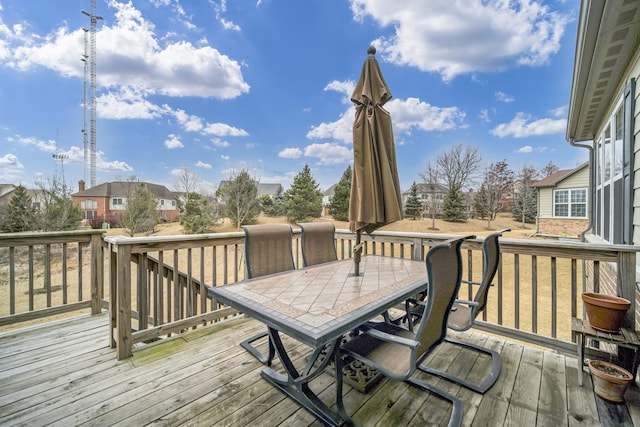 wooden deck with outdoor dining area