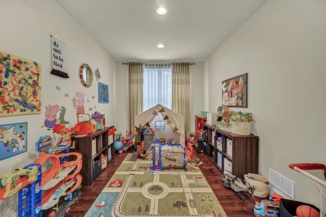 game room featuring wood finished floors, visible vents, and recessed lighting