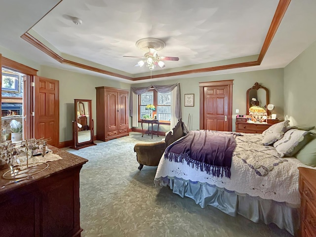11307 Timber Lane Rd, Lena, IL 61048 - carpeted bedroom featuring a tray ceiling and ceiling fan