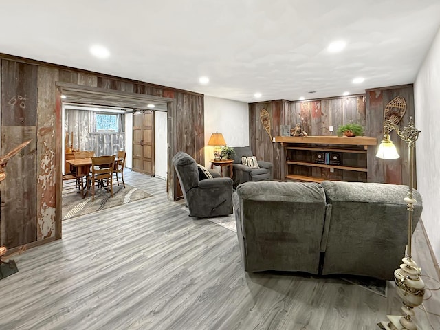 11307 Timber Lane Rd, Lena, IL 61048 - living area featuring wooden walls, wood finished floors, and recessed lighting