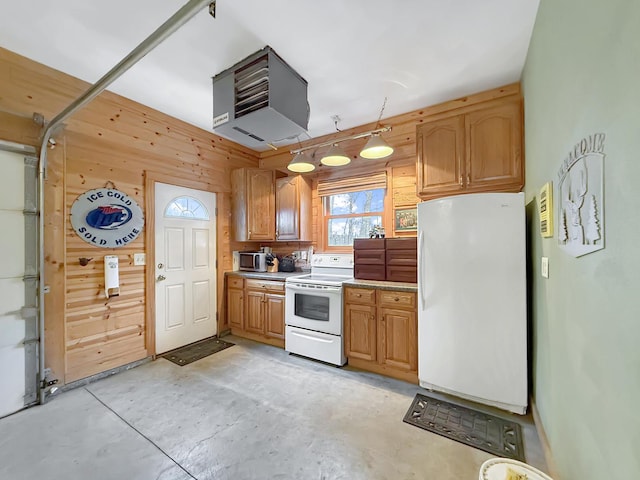 11307 Timber Lane Rd, Lena, IL 61048 - kitchen featuring white appliances, a heating unit, wooden walls, concrete floors, and light countertops