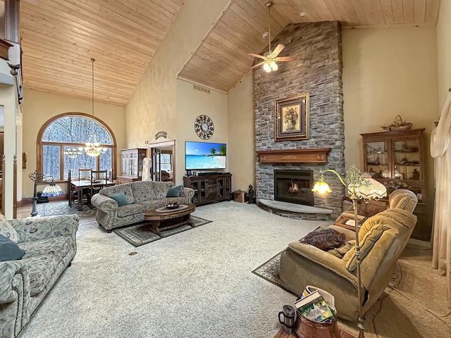 carpeted living room with high vaulted ceiling, wooden ceiling, and a fireplace