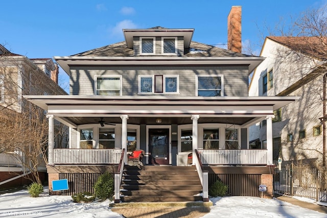 traditional style home with covered porch and ceiling fan