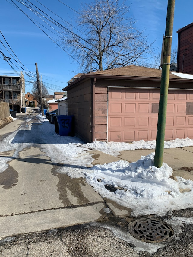 view of snow covered garage