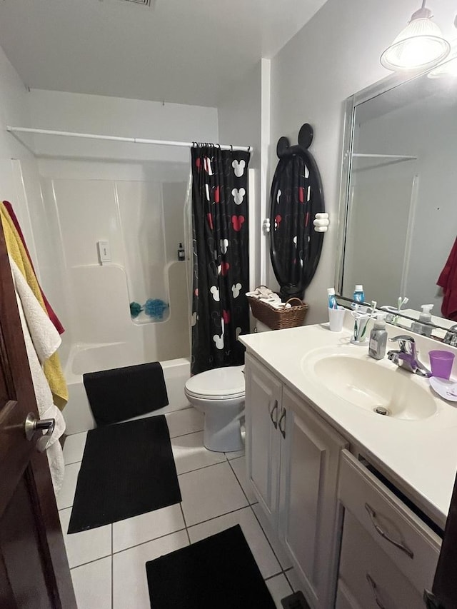 full bathroom with toilet, shower / bath combination with curtain, tile patterned flooring, and vanity