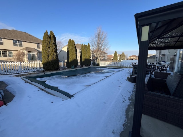 exterior space with a residential view and fence