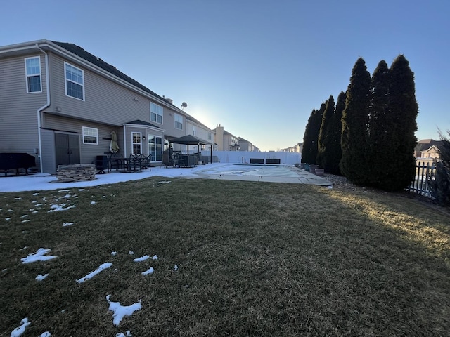 view of yard with a patio and fence