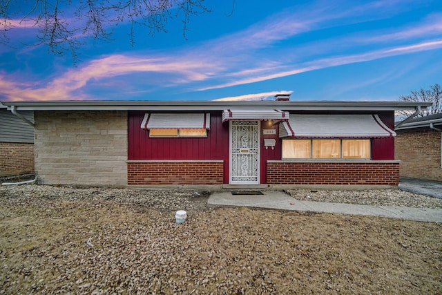 view of front of property with brick siding