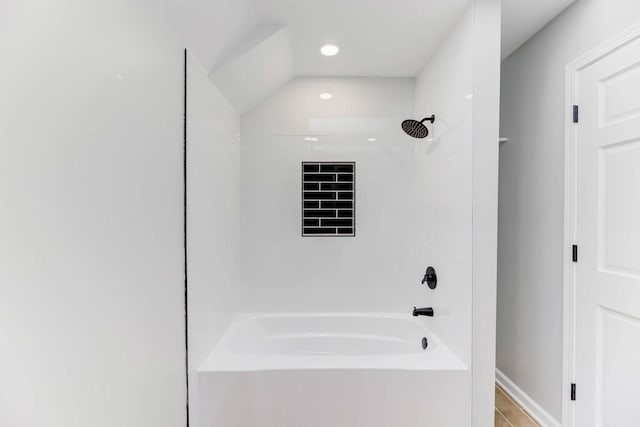 full bathroom with baseboards, washtub / shower combination, and recessed lighting