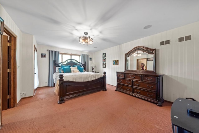 bedroom featuring light carpet and visible vents