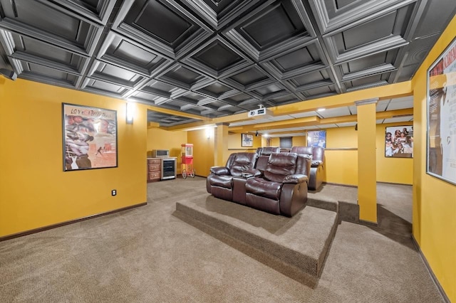 cinema room with carpet floors, wine cooler, baseboards, and coffered ceiling