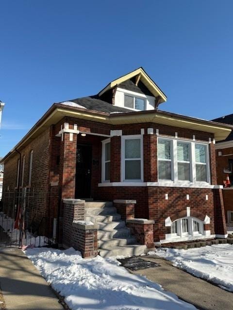 view of front of home with brick siding