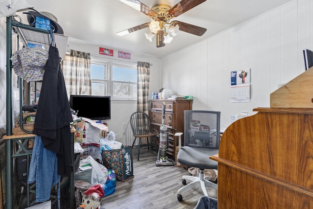 home office featuring a ceiling fan and wood finished floors