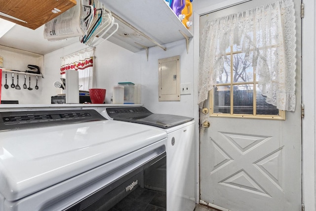 washroom with laundry area, electric panel, and separate washer and dryer