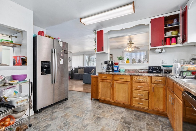 kitchen with stainless steel fridge, a ceiling fan, dishwasher, brown cabinets, and open shelves