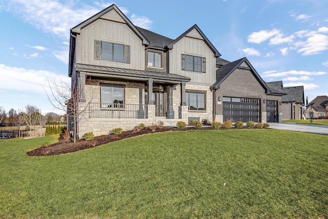 modern inspired farmhouse featuring driveway, a standing seam roof, a front yard, and board and batten siding