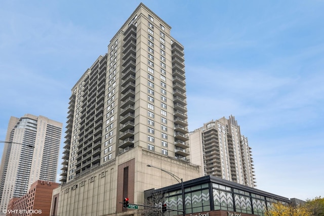 view of building exterior featuring a view of city