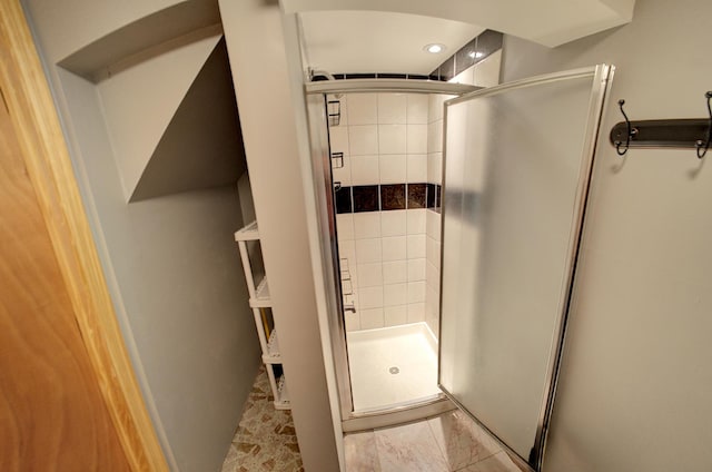 bathroom with a stall shower