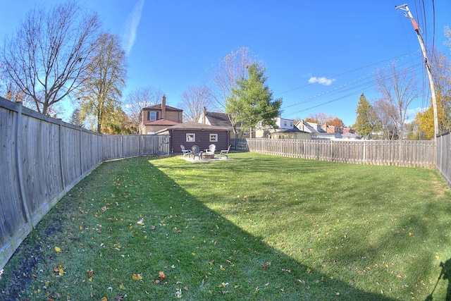 view of yard featuring a patio and a fenced backyard