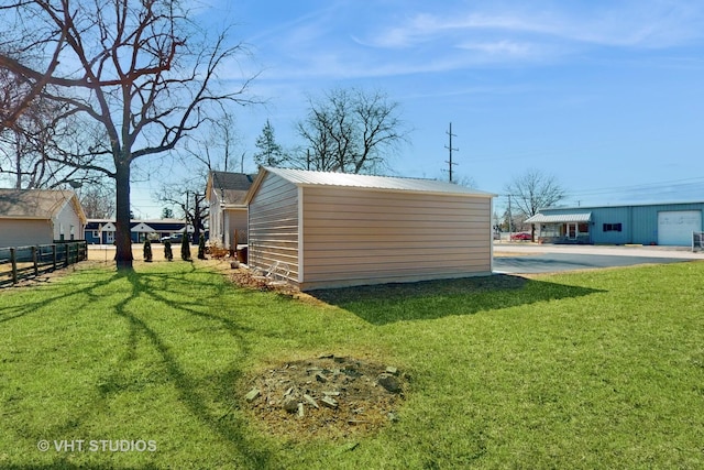 view of outdoor structure featuring fence