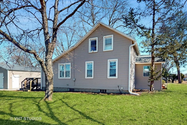 view of home's exterior featuring a yard