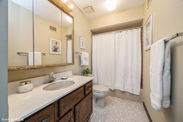 full bath featuring visible vents, vanity, toilet, and tile patterned floors