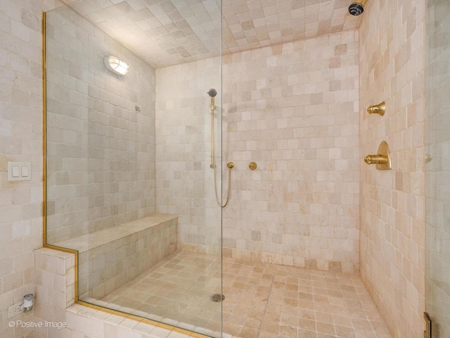 bathroom featuring tiled shower