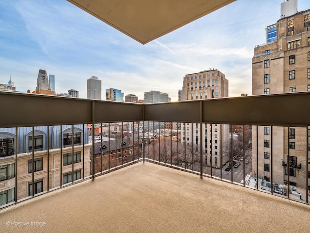 balcony featuring a view of city