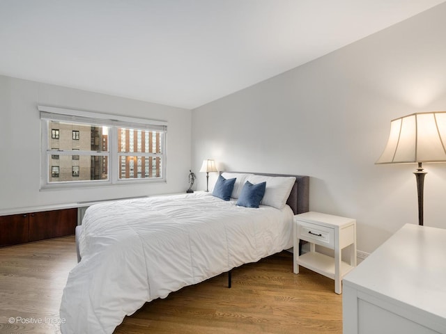 bedroom featuring light wood-type flooring