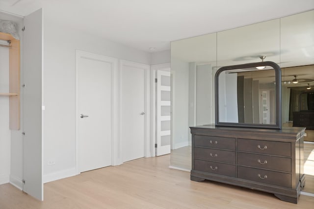 bedroom with light wood-style floors