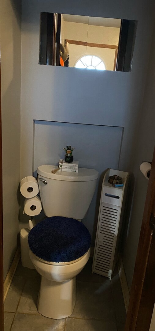 bathroom featuring toilet