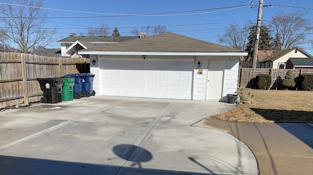 detached garage with fence