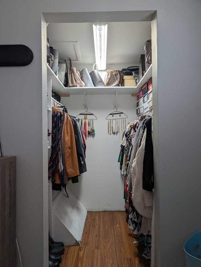 spacious closet with wood finished floors