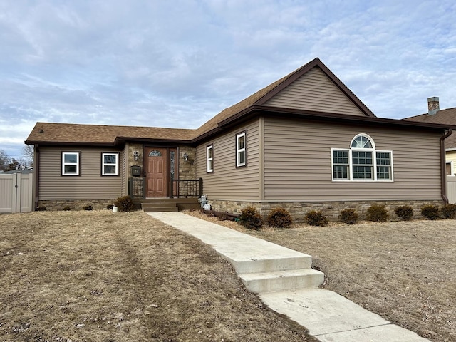 single story home with a chimney