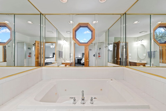 full bath featuring a whirlpool tub, a shower stall, and connected bathroom