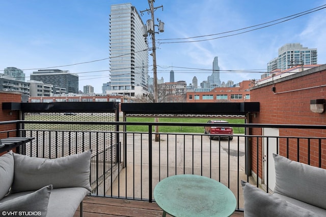 balcony featuring a view of city