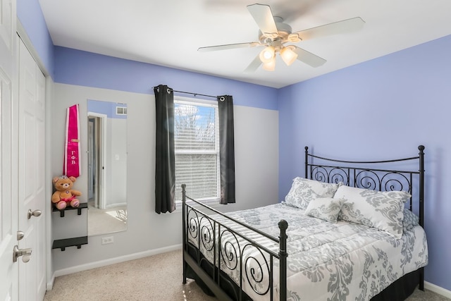 bedroom featuring a ceiling fan, a closet, visible vents, and baseboards