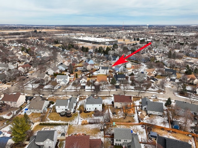 birds eye view of property with a residential view