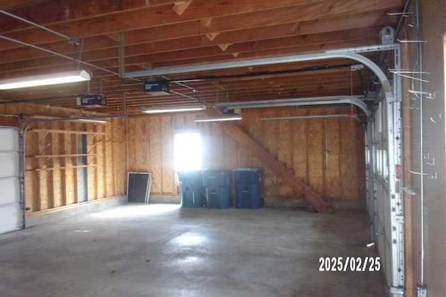 garage featuring a garage door opener