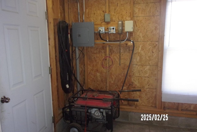 utility room featuring electric panel