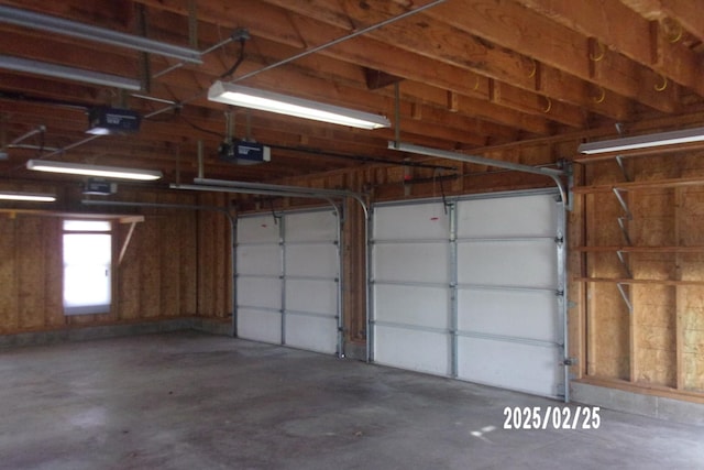 garage featuring a garage door opener