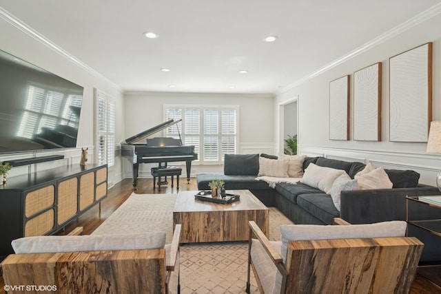 living room featuring ornamental molding, dark wood-type flooring, and recessed lighting